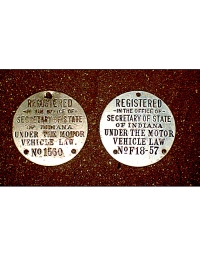 old Indiana metal dashboard discs