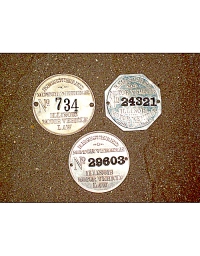 old Illinois metal dashboard discs
