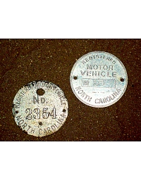 old North Carolina aluminum dashboard discs